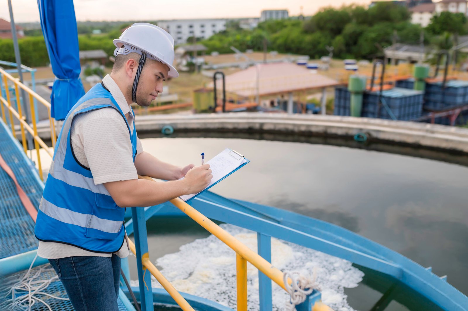 Environmental engineers work at wastewater treatment plants,Water supply engineering working at Water recycling plant for reuse
