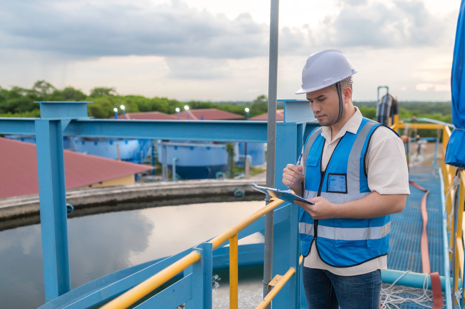 Environmental engineers work at wastewater treatment plants,Water supply engineering working at Water recycling plant for reuse
