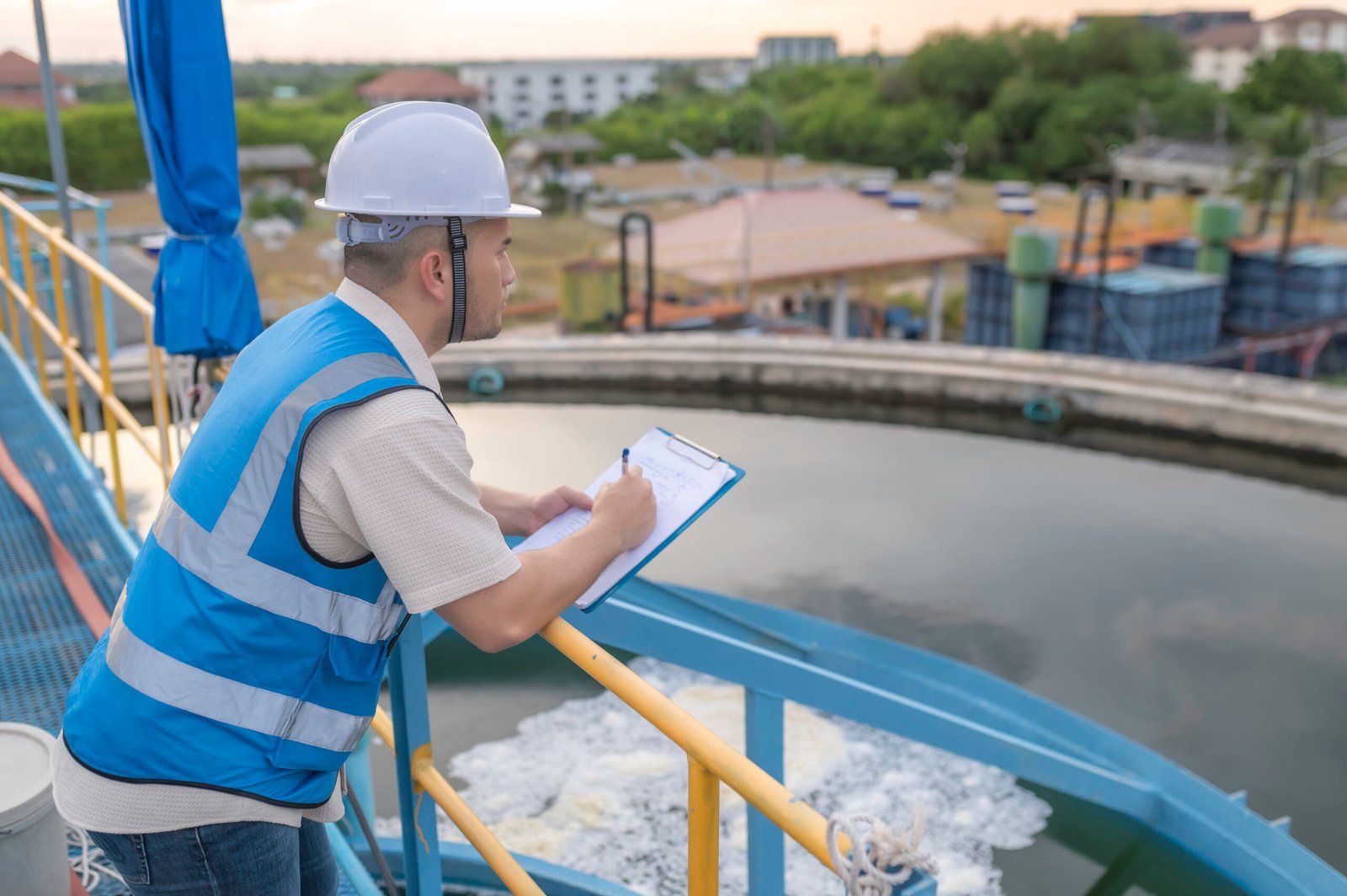 Environmental engineers work at wastewater treatment plants,Water supply engineering working at Water recycling plant for reuse